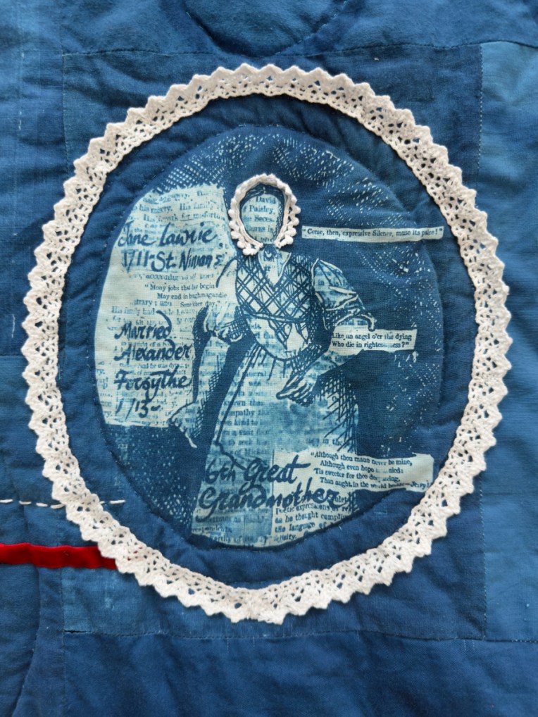 Detail of embroidered quilt, using cyanotype and re-used textiles and trimmings. Featuring illustrations of Lois's female ancestry.