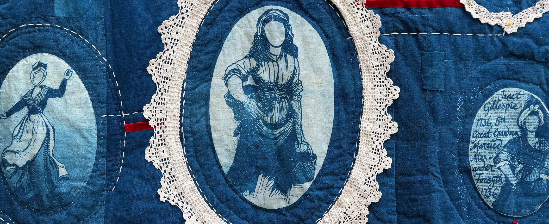 Detail of Blue and White quilt, using cyanotype to transfer drawings of artists female ancestors. Work has appliqué and hand stitch details.