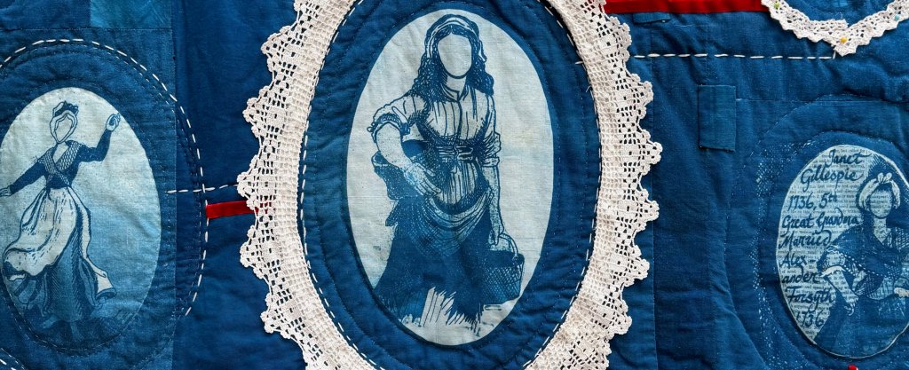 Detail of Blue and White quilt, using cyanotype to transfer drawings of artists female ancestors. Work has appliqué and hand stitch details.